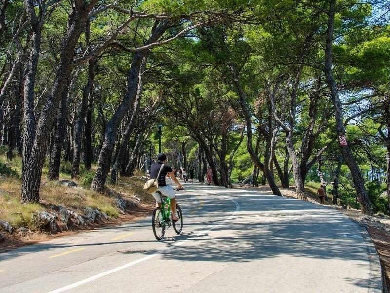 Boy on bicycle on Marjan hill in Split